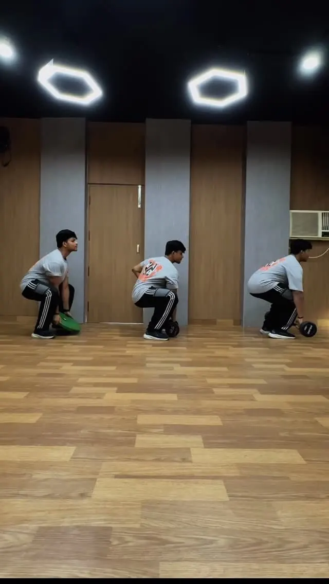 Members squatting together